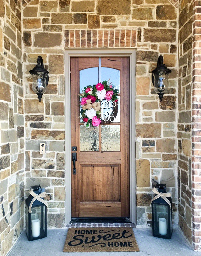 Stone exterior with wood door Stone exterior wood front door ideas Farmhouse exterior ideas