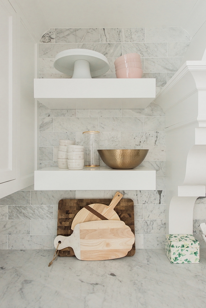 chunky white floating shelves Kitchen chunky white floating shelves Kitchen features chunky white floating shelves over white marble backsplash chunky white floating shelves #chunkywhitefloatingshelves #chunkyfloatingshelves #floatingshelves