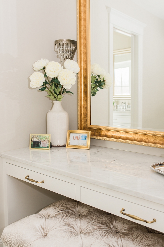 Vanity countertop is polished Carrara marble