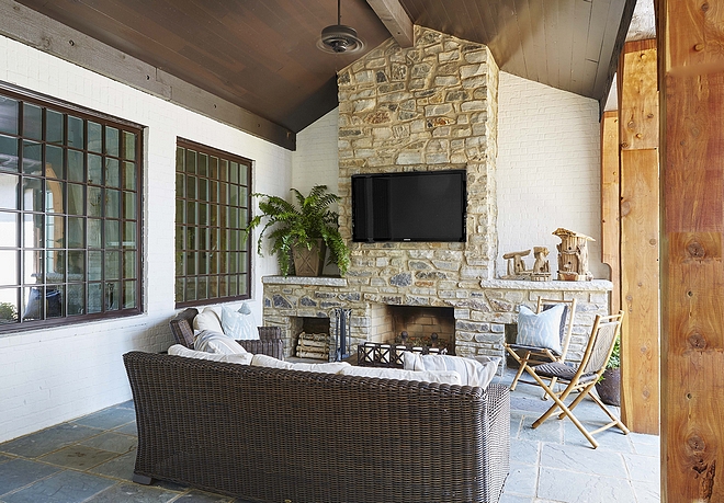 Firerock fireplace The back porch features a Firerock fireplace Firerock fireplace Firerock fireplace The back porch features a Firerock fireplace and Bluestone floor tile