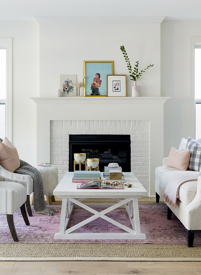 White living room fireplace The living room features a painted brick fireplace and inviting decor #livingroom #whitefireplace #paintedbrick