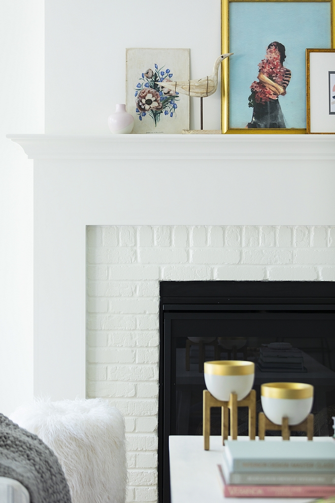 Painted Brick Fireplace Paint Color The painted brick fireplace paint color is White Dove by Benjamin Moore #paintedbrick #paintedbrickfireplace #paintcolor #WhiteDovebyBenjaminMoore