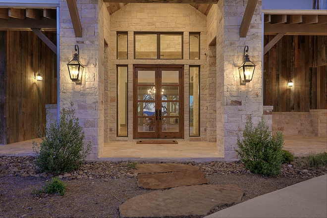 Farmhouse featuring Exterior Shiplap and stone siding Home features 100 year old reclaimed shiplap siding Farmhouse featuring Exterior Shiplap and stone siding ideas #Farmhouse #ExteriorShiplap #stone #siding