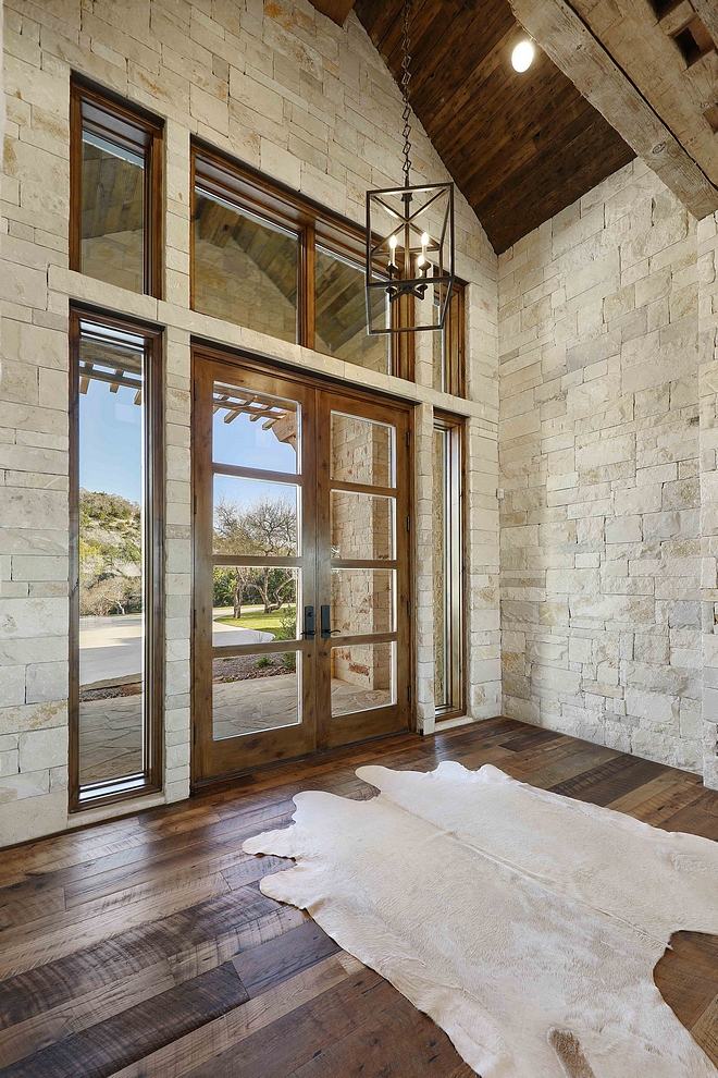 Stone Foyer Foyer with stone wall reclaimed ceiling beam reclaimed wood shiplap on ceiling reclaimed hardwood floor and glass front door Foyer stone wall reclaimed ceiling beam reclaimed wood shiplap on ceiling reclaimed hardwood floor and glass front door stone wall reclaimed ceiling beam reclaimed wood shiplap on ceiling reclaimed hardwood floor and glass front door #stonewall #reclaimedbeam #reclaimedshiplap #reclaimedhardwood