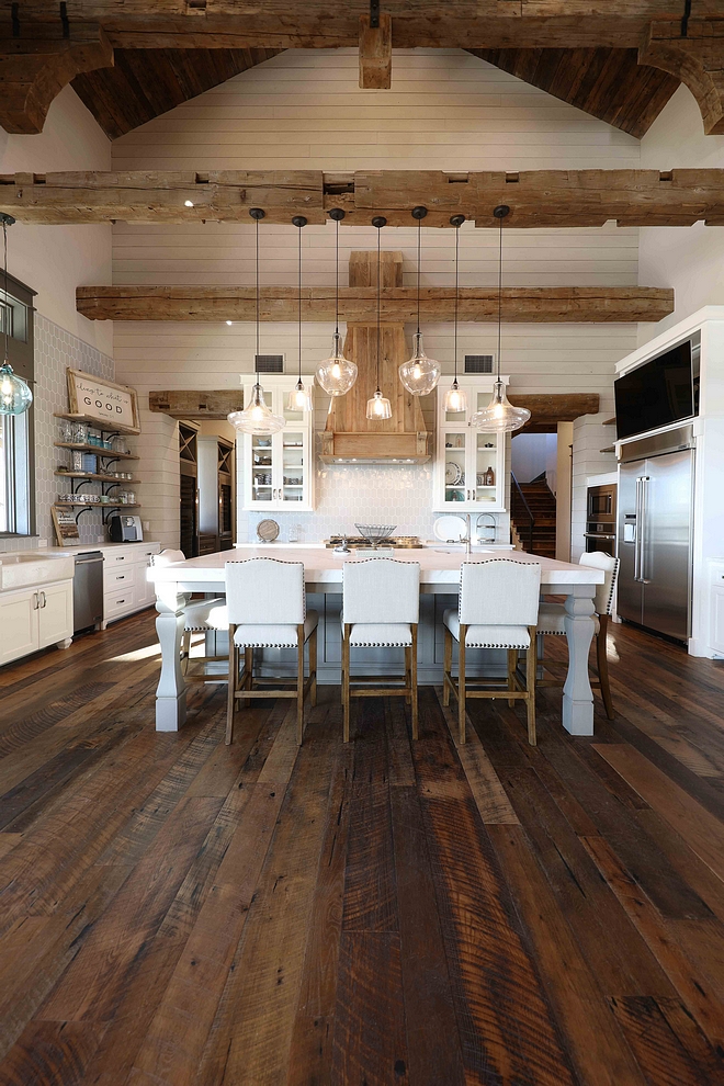 Rustic Kitchen Rustic Kitchen Gorgeous textures were added to this rustic kitchen with reclaimed wood floors, shiplap walls, reclaimed beams and reclaimed barn wood #rustickitchen #reclaimedwoosfloors #shiplap #reclaimedbeams #barnwood