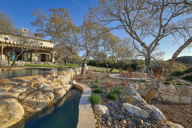 Backyard with pool and firepit