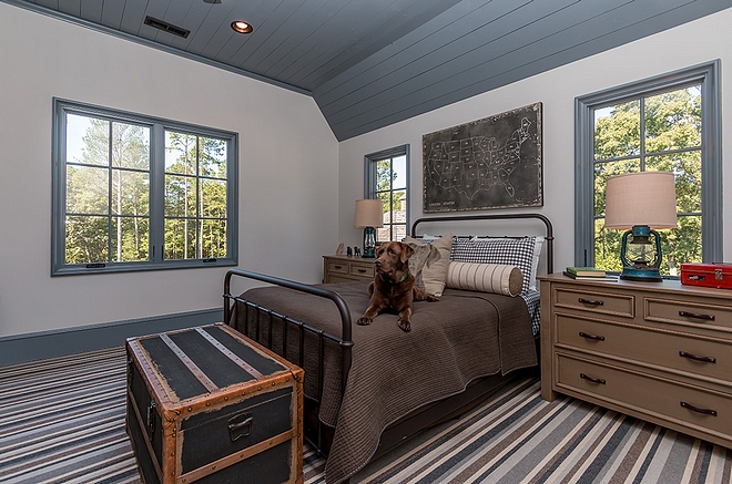Industrial Farmhouse Boys bedroom with striped carpet shiplap ceiling and black metal bed #bedroom #industrialfarmhouse #blackmetalbed