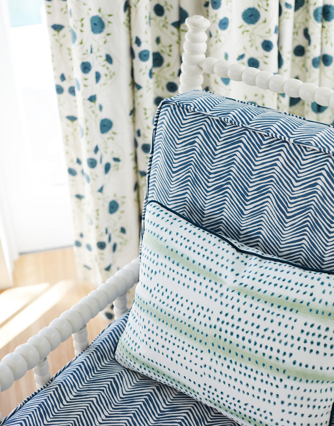 Spindle chair with blue and white fabric and lumbar pillow. Summery home decor #blueandwhite #spindlechair #whitespindlechair #pillow #summerydecor #homedecor