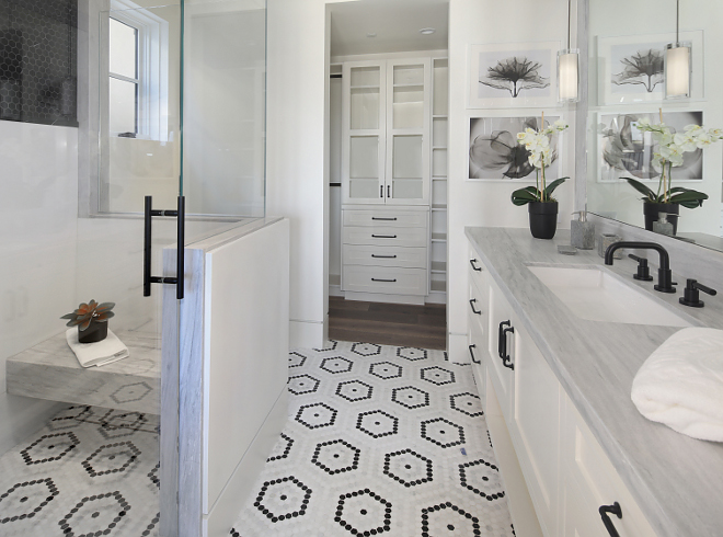 Shower Tile Shower features Crystal White Thassos slab (up to 60") and Hex China Black tile above it #showertile