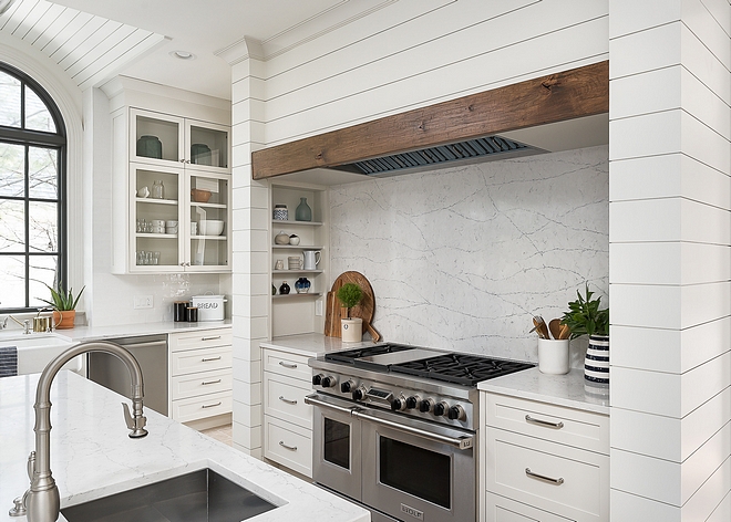 Shiplap Kitchen Shiplap Kitchen Hood Shiplap Hood The custom hood area features shiplap painted in Benjamin Moore White Dove with integrated spice shelves at each end and a custom distressed beam for the mantel #shiplaphood #shiplapkitchen #shiplap #kitchen