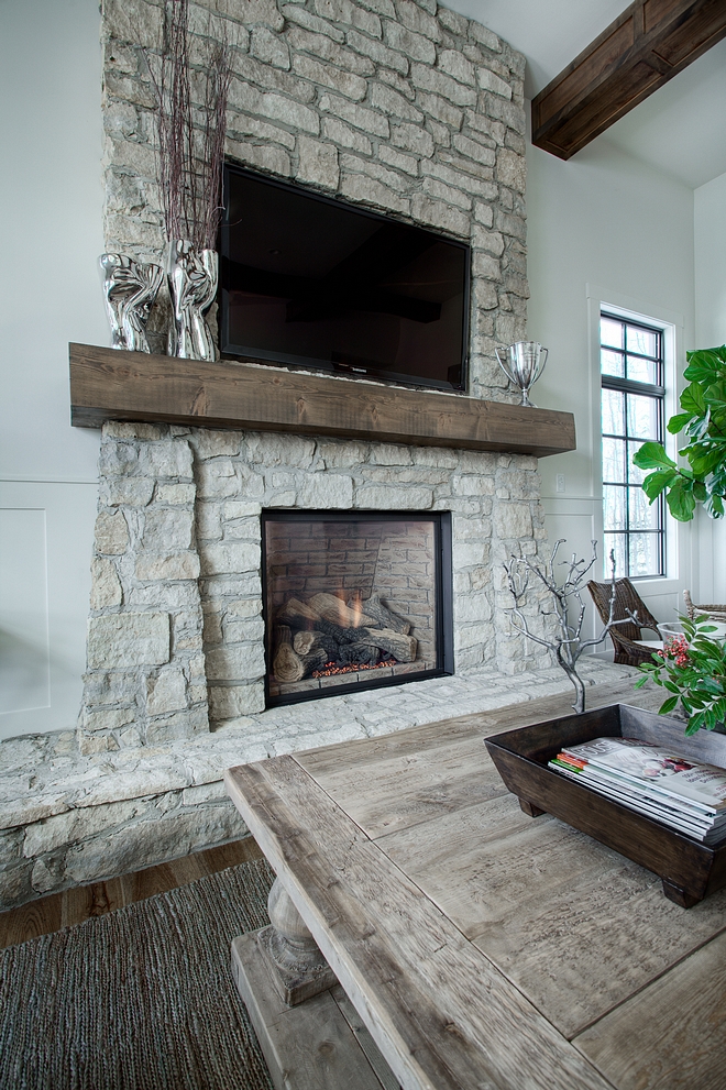 Rustic Stone Fireplace The stone on the fireplace is a natural stone veneer It’s similar to Montana Quartz Farmhouse Rustic Stone Fireplace #RusticStoneFireplace #RusticFireplace #StoneFireplace