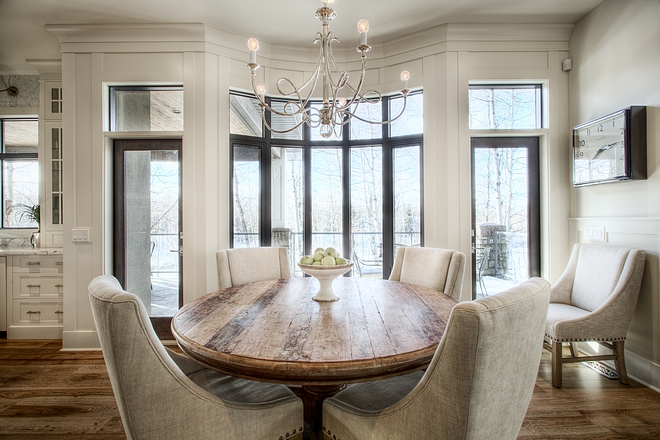 Breakfast Nook windows Bow window flanked by patio doors help define the space for this breakfast nook breakfast nook windows #breakfastnook #windows #bowwindows