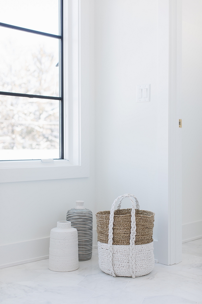 White Bathroom Paint Color Wall color is Extra White by Sherwin Williams bathroom features black steel windows #ExtraWhitebySherwinWilliams