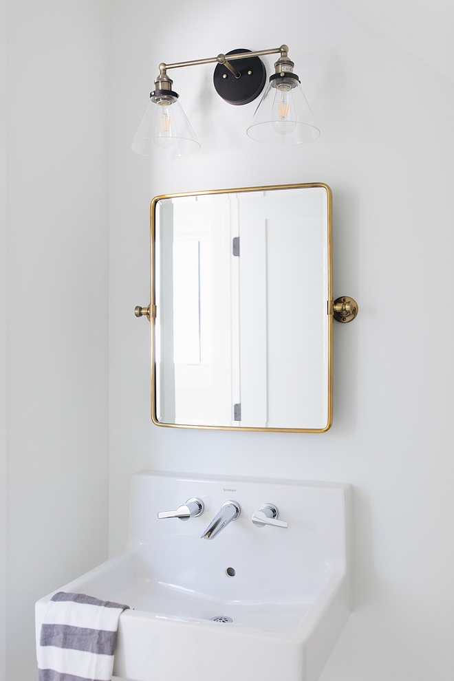Brass Bathroom Mirror with sconce above Brass Mirror Bathroom Brass mirror #brassbathroommirror #bathroom #brassmirror #bathroomirror #bathroombrassmirror