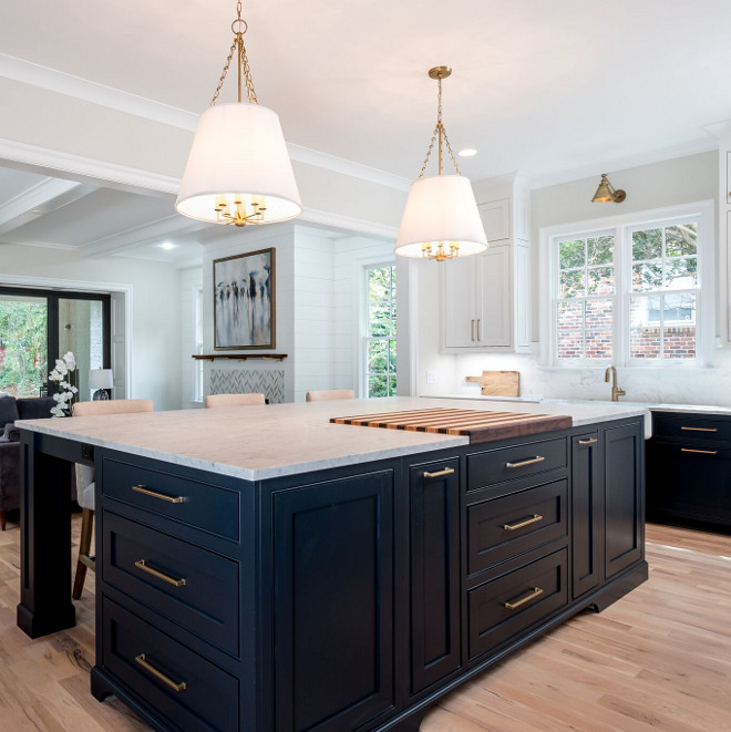 Sooth by Benjamin Moore kitchen island Sooth by Benjamin Moore with honed white marble countertop and large brass pulls #SoothbyBenjaminMoore