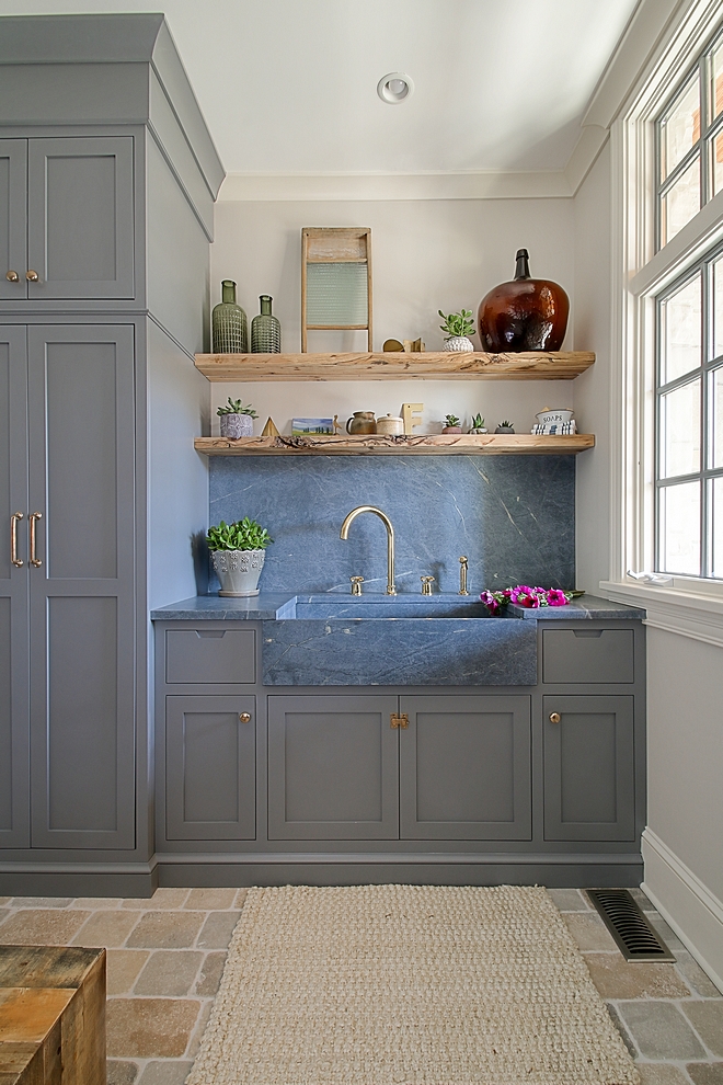 Farmhouse Mudroom Farmhouse Mudroom The mudroom features a Soapstone sink and backsplash #FarmhouseMudroom #Farmhouse #Mudroom #Soapstone #sink #backsplash