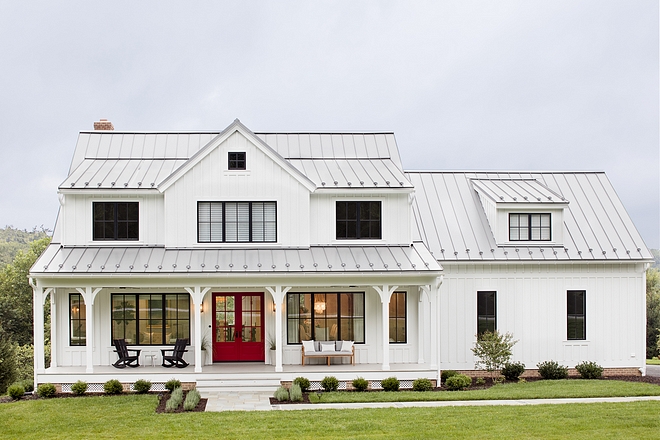 Modern Farmhouse Exterior modern farmhouse features white board and batten siding, brick and black steel windows The roof is metal They feature snow guards, which help to keep snow and ice from falling ##ModernFarmhouse #ModernFarmhouseExterior