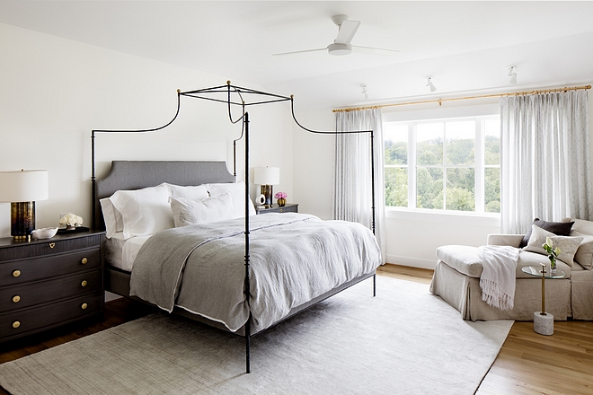 Benjamin Moore Simply White Bedroom with white oak hardwood flooring and neutral rug #benjaminmooresimplywhite #bedroom #whiteoak #hardwoodflooring #neutralrug