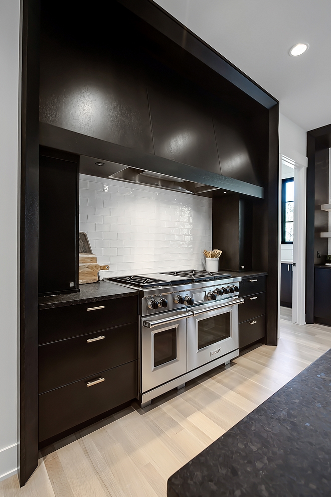 Kitchen Dark Cabinet Dark Cabinetry Kitchen Cabinet All black stained windows and cabinetry is a custom blended black stain and it was shaded to create the depth that you see in the images Any painted cabinets are created with MDF and paint grade woods #KitchenDarkCabinet #DarkCabinet #Cabinetry #KitchenCabinet