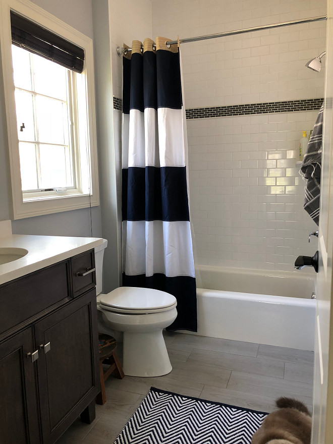 Boys Bathroom Neutral Boys Bathroom You cannot go wrong with subway tile and the floor is a subtle textured rectangular tile Boys Bathroom #Boysbathroom