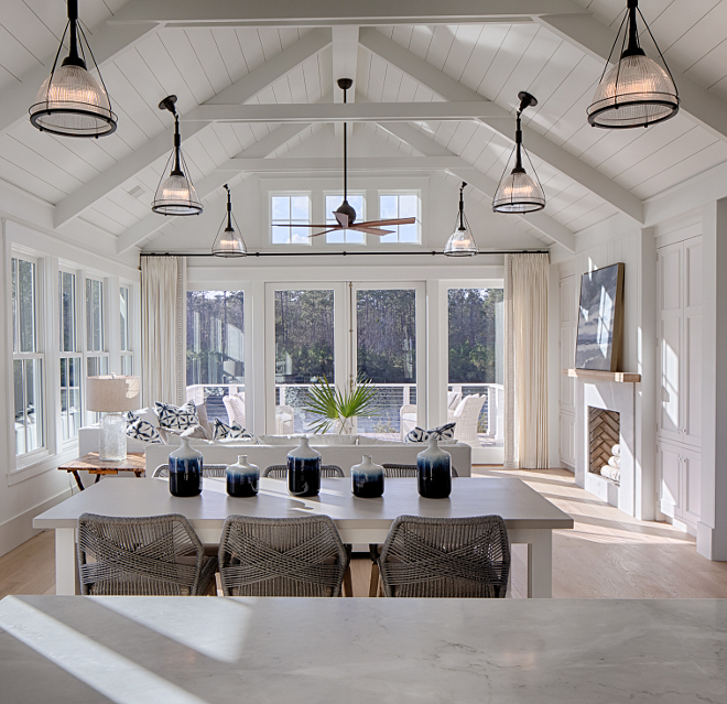 vaulted ceiling clad in nickelgap, trusses and beams Open concept vaulted ceiling clad in nickelgap, trusses and beams Ceiling treatment vaulted ceiling clad in nickelgap, trusses and beams - all painted Benjamin Moore "White" #vaultedceiling #cladinnickelgap #trusses #beams #ceiling