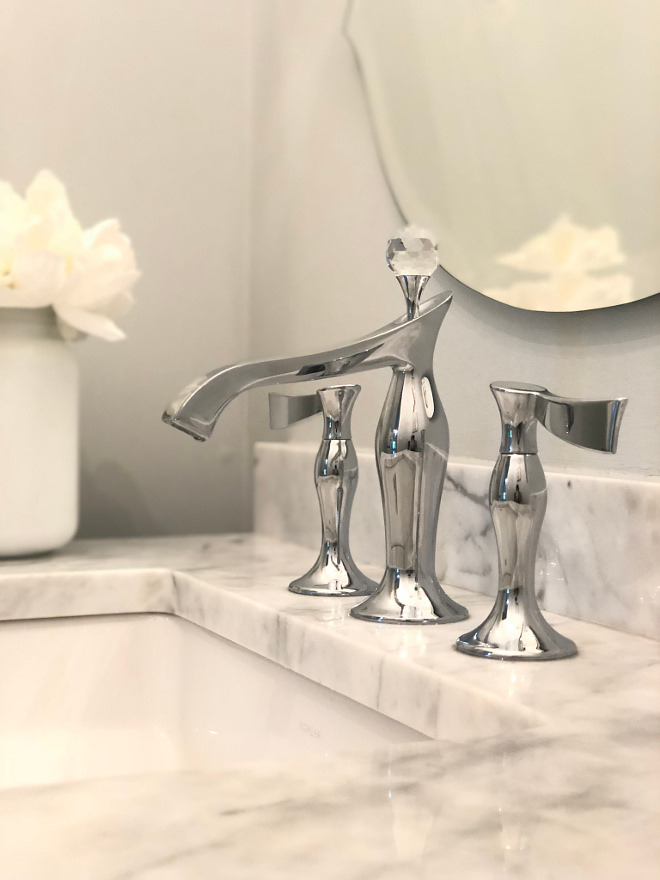 Bathroom faucet with Swarovski Crystal Finial This powder room faucet had me at hello I just had to get it The movement reminds me of water and the crystal ball on the top is just the icing on the cake source on Home Bunch #faucet #Swarovski #Crystalfaucet