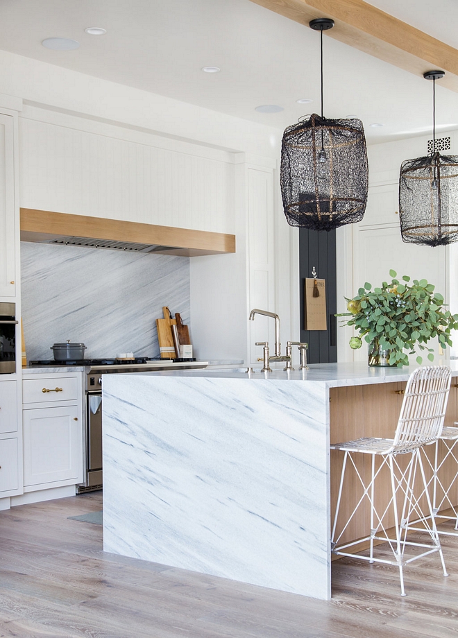 Waterfall kitchen island with white marble Countertop surrounding the kitchen island is White Cherokee Polycor Waterfall kitchen island #Waterfallkitchenisland