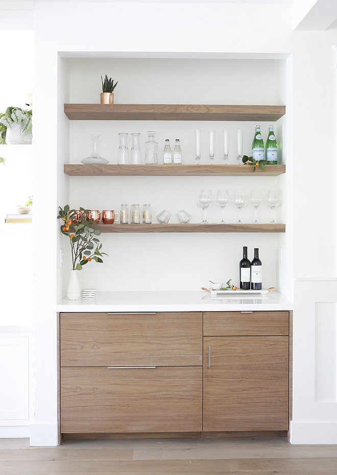 Bar Bar Cabinet The cabinets are custom built with a walnut wood and a glass countertop We used open shelving above in matching walnut wood to display glassware #bar #barcabinet #shelves