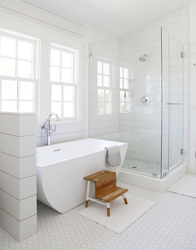 Bathroom Shiplap and Hexagon Tile We kept it clean with all white tiles and mixed it up with the patterns with shiplap and hexagon tile #bathroom #shiplap #hexagontile #tilepattern