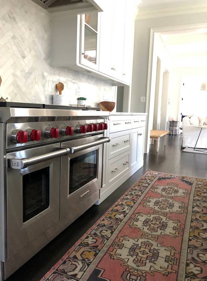 White Kitchen with Blush Pink and Navy Vintage Runner and white marble herringbone backsplash Blush Pink and Navy Vintage Runner Kitchen Runner #kitchenrunner #BlushPinkNavyRunner #VintageRunner