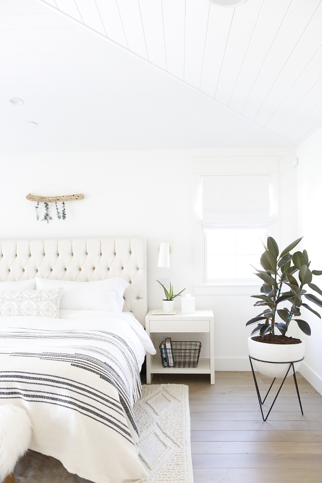 Simply White by Benjamin Moore Bedroom The Master bedroom looks out onto our backyard and has vaulted tongue and groove ceilings for added height The floors here and throughout the house are a French Oak wood with a custom stain #SimplyWhitebyBenjaminMoore #Bedroom