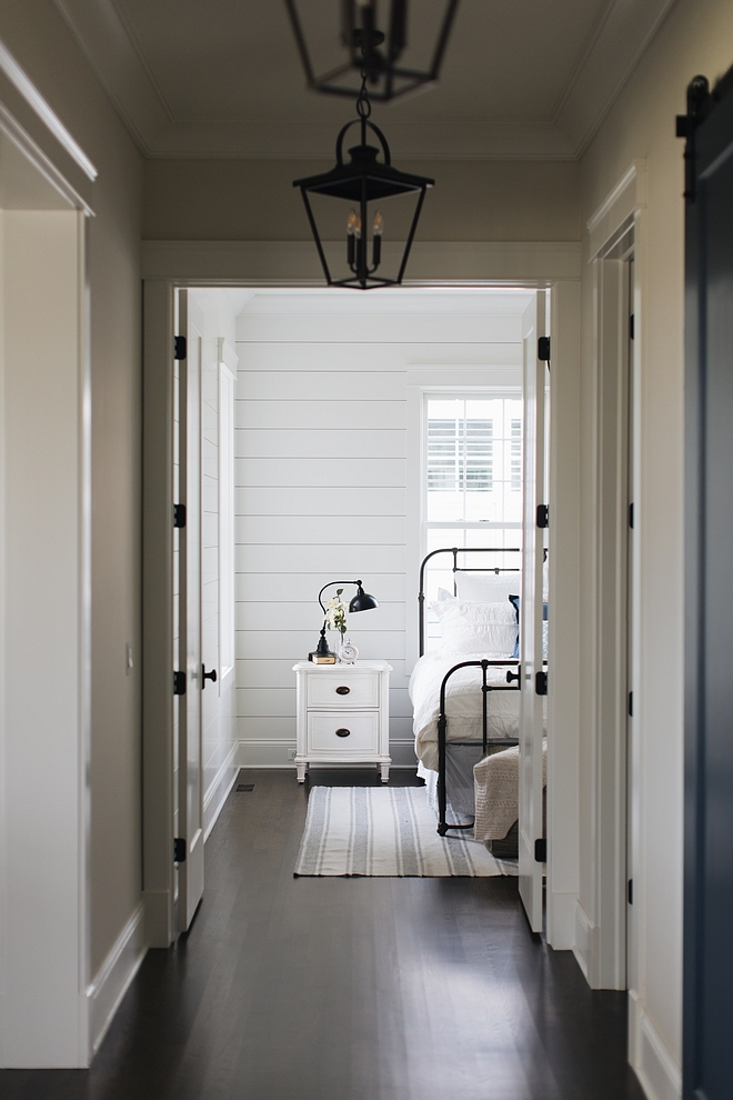 Benjamin Moore Simply White Shiplap Paneling Paint Color with Simply White Trim and Dark Hardwood Flooring #BenjaminMooreSimplyWhite #Shiplap #Paneling #PaintColors