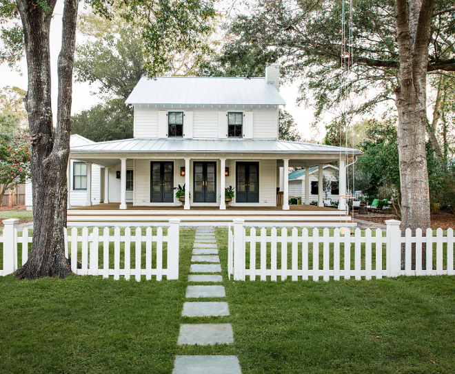 Sherman Williams Snowbound Home Siding Paint Color Notice the wrap-around porch and the tree with a swing Siding paint color is Sherman Williams Snowbound #ShermanWilliamsSnowbound