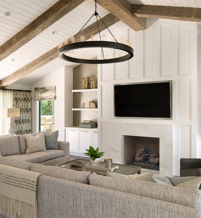 Living room paneling thick board and batten on fireplace with vaulted ceiling featuring reclaimed beams Board and batten fireplace vaulted ceiling fireplace Board and batten fireplace vaulted ceiling fireplace Board and batten fireplace vaulted ceiling fireplace #Boardandbattenfireplace #vaultedceiling #fireplace