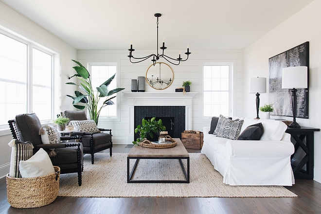 The family room that is right off the Kitchen is 16’x20’ It is a nice size with lots of large windows I used shiplap to clad the fireplace wall to add some detail without breaking the bank of shipping the whole space Just that one wall really helped to add visual detail to the room #familyroom #shiplap