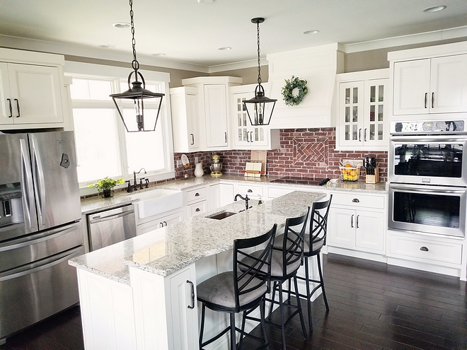 Farmhouse kitchen The shaker style cabinets are recessed, painted Sherwin Williams SW 7008 Alabaster with dark bronze hardware Sherwin Williams SW 7008 Alabaster Sherwin Williams SW 7008 Alabaster #SherwinWilliamsSW7008Alabaster