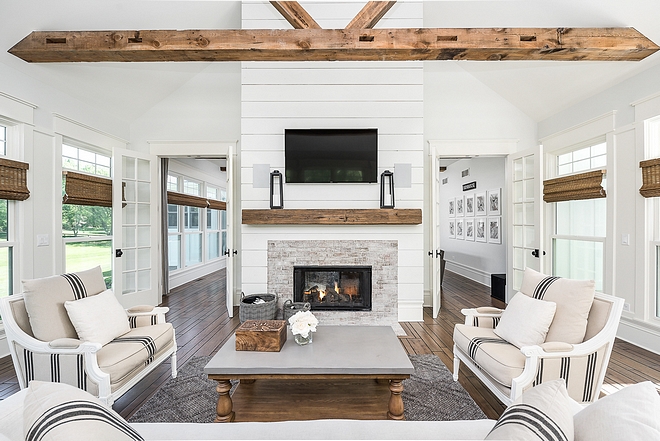 Shiplap fireplace This side of the fireplace features shiplap paneling, whitewashed brick and ceilings feature reclaimed beams Shiplap fireplace Reclaimed Beams Reclaimed Wood Reclaimed Shiplap fireplace #Shiplap #fireplace #reclaimedwood
