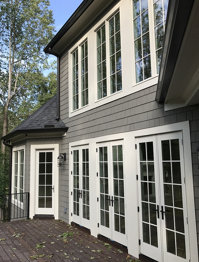 Sherwin Williams Anonymous siding with white windows and doors Sherwin Williams Anonymous Sherwin Williams Anonymous #SherwinWilliamsAnonymous