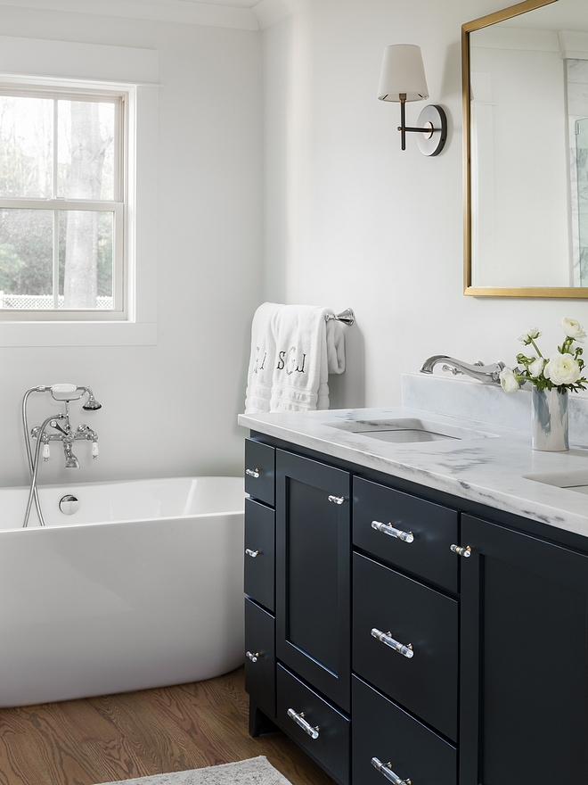 Modern Farmhouse Bathroom Custom Cabinetry is also painted in Blue Black by Farrow & Ball Countertop is 3cm Montclair Danby Honed marble #ModernFarmhouseBathroom