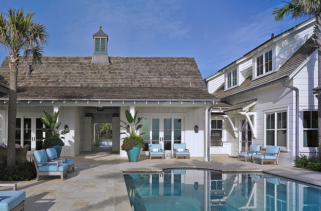 Beach house backyard with pool and poolhouse