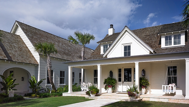 White cottage with front porch and swings White cottage White cottage exterior #whitecottage #cottage #frontporch #porch #swing