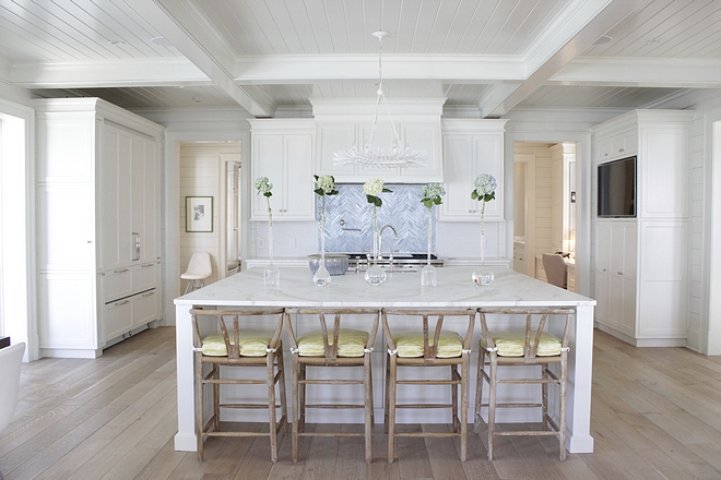 Kitchen Design Classic yet clean-lined kitchen There's nothing overly done in this space Notice the fridge & freezer cabinet on the left and the pantry cabinet with a built-in tv, on the right #kitchendesign