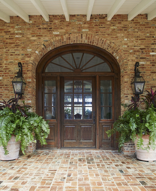 Traditional Front Door This oversized reclaimed Cypress front door, with an elliptical transom and sidelites, adds a traditional but casual element Traditional Front Door Traditional Front Door #TraditionalFrontDoor #TraditionalDoor #FrontDoor