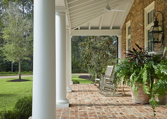 Brick Porch Brick front porch with large columns and exposed rafters Porch Ceiling, Trim and Columns Paint Color Benjamin Moore "Swiss Coffee" #porch #brickporch #rafters #frontporch #brick #porchcolumns