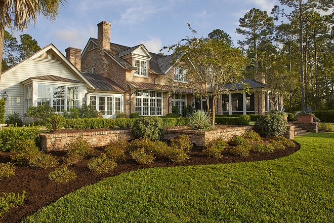 Backyard The rear yard is a raised terrace flanked by a screened porch and pool, becoming a garden courtyard perfect for entertaining family and guests #backyard