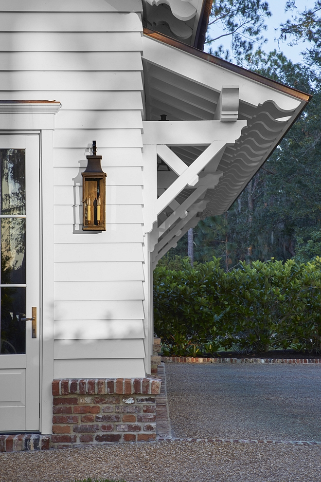 Traditional Garage Traditional details like these ornate rafter tails and brackets speak to the low-country vernacular architecture Traditional Garage Architecture #TraditionalGarage #garage #architecture