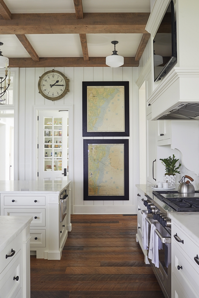 Kitchen Hardwood Flooring Wide-plank, reclaimed heart pine flooring carries throughout the home with occasional brick flooring in ancillary spaces #KitchenHardwoodFlooring #Kitchen #HardwoodFlooring #Wideplankflooring #reclaimedhardwoodflooring #heartpineflooring