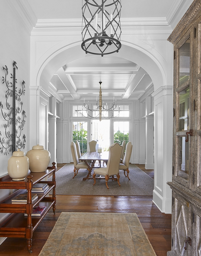 Foyer Traditional Foyer Traditional Interiors The foyer and dining room connect via an elliptical arch, creating a formal association between the front and rear while also allowing natural light to permeate throughout #foyer #entry #traditionalfoyer #traditionalhomes #traditionalinteriors