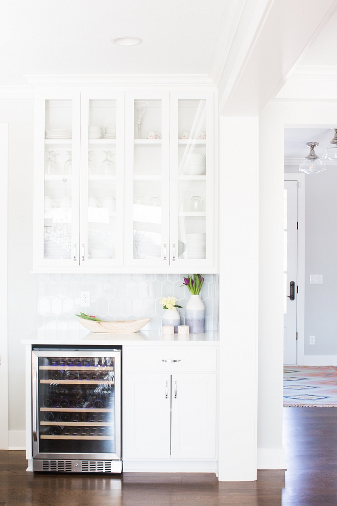 Kitchne bar The kitchen also features a bar cabinet with under-counter beverage fridge #kitchenbar #beveragefridge #bar #barcabinet