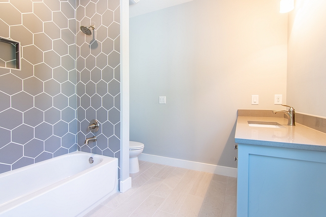 Hexagon Shower Tile These large hexagon tiles are quite affordable and looks amazing #hexagonshowertile
